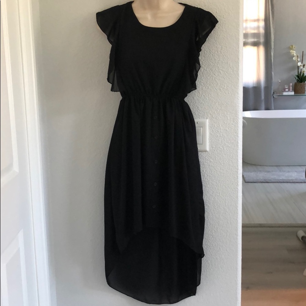 Black high low dress. Sheer